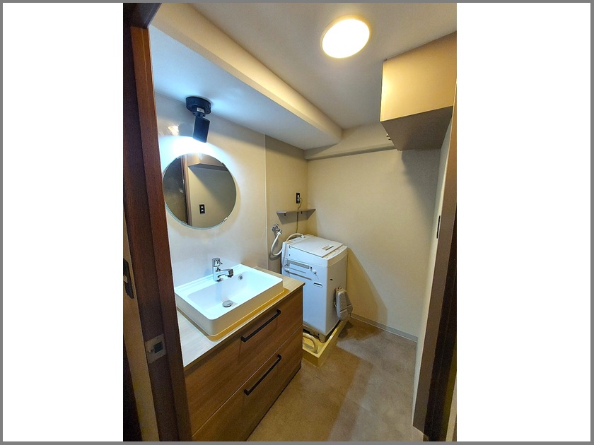 分譲マンションの一室の洗面室改修工事